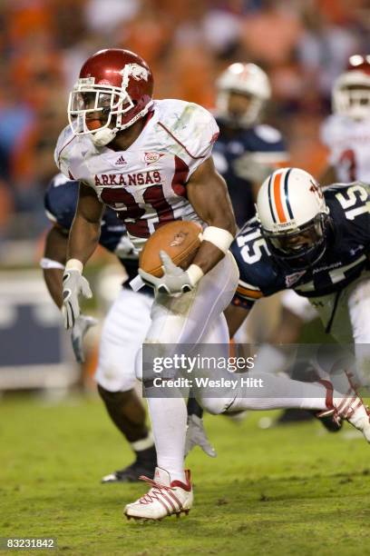 Michael Smith of the Arkansas Razorbacks runs for a touchdown against the Auburn Tigers at Jordan-Hare Stadium on October 11, 2008 in Auburn,...