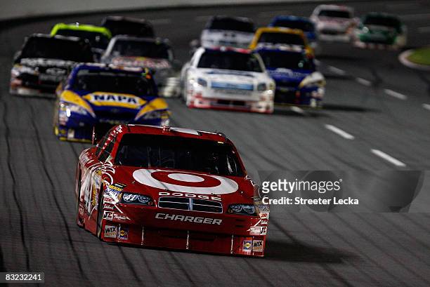 Reed Sorenson, driver of the Target Dodge, leads a group of cars during the NASCAR Sprint Cup Series Bank of America 500 at Lowe's Motor Speedway on...