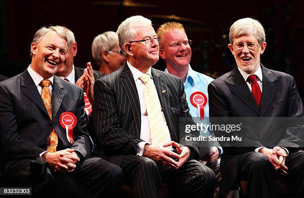Defence Minister Phil Goff, Finance Minister Dr Michael Cullen and Dr Peter Davis sit on stage as the New Zealand Labour Party lauch their election...