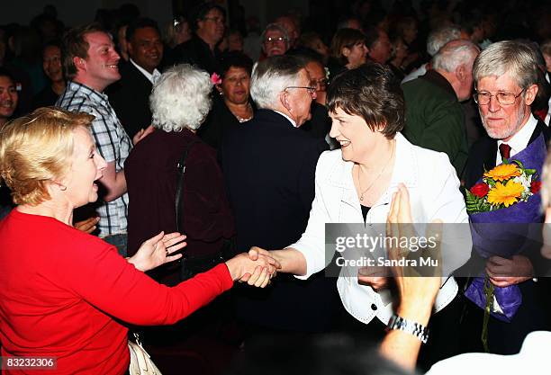 Prime Minister Helen Clark followed by Husband Dr Peter Davis shakes the hands of Labour supporters as she leaves after the New Zealand Labour Party...
