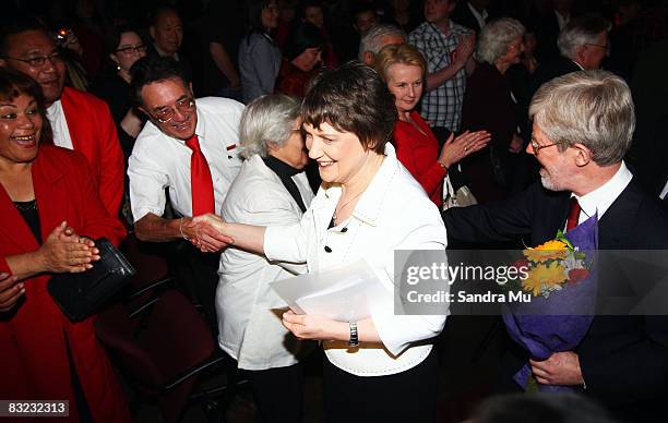 Prime Minister Helen Clark followed by Husband Dr Peter Davis shakes the hands of Labour supporters as she leaves after the New Zealand Labour Party...