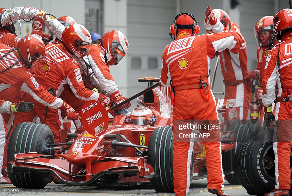 Ferrari's staff members refuel Finland's