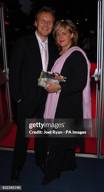 Actor Anthony Head and Sarah Fisher arrives for the charity gala screening of The Devil Wears Prada at the Odeon Leicester Square, central London.