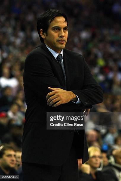 Miami Heat coach Erik Spoelstra looks on during the NBA preseason game as part of the 2008 NBA Europe Live Tour between New Jersey Nets and Miami...