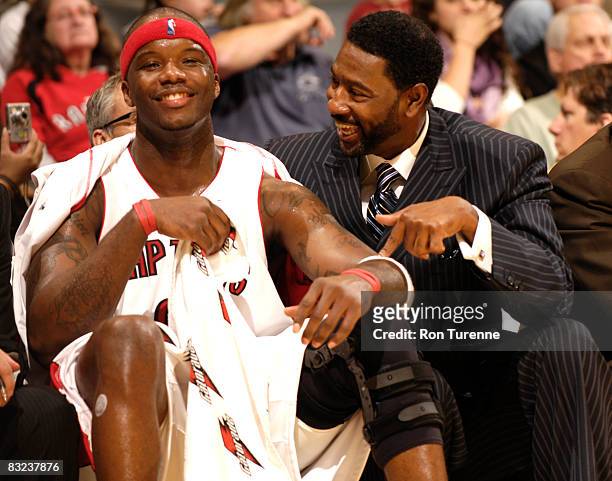 Head Coach Sam Mitchell and Jermaine O'Neal of the Toronto Raptors talk during a game against the Philadelphia 76ers on October 12, 2008 at the Air...