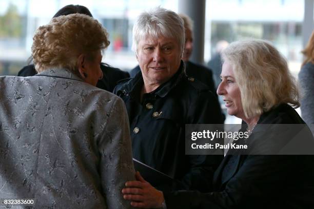 Raelene Boyle talks with other mourners following the funeral service for Betty Cuthbert at Mandurah Performing Arts Centre on August 16, 2017 in...