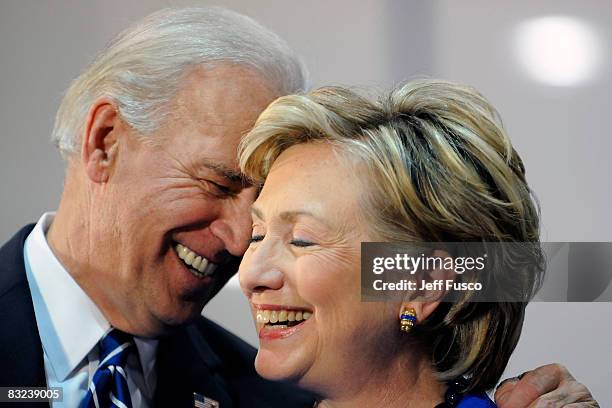 Democratic vice presidential candidate U.S. Senator Joe Biden and U.S. Sen. Hillary Clinton smile at a rally in support of Democratic presidential...