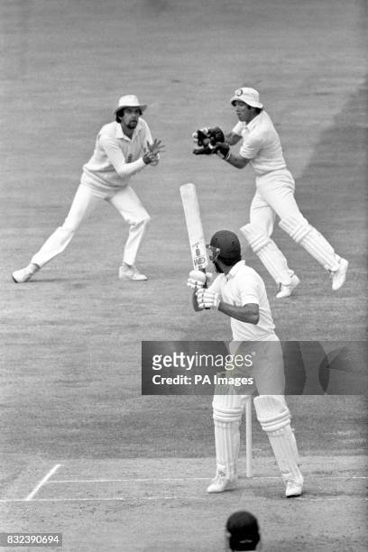 England wicketkeeper Bob Taylor takes a catch to dismiss Pakistan's Zaheer Abbas as teammate Geoff Miller looks on