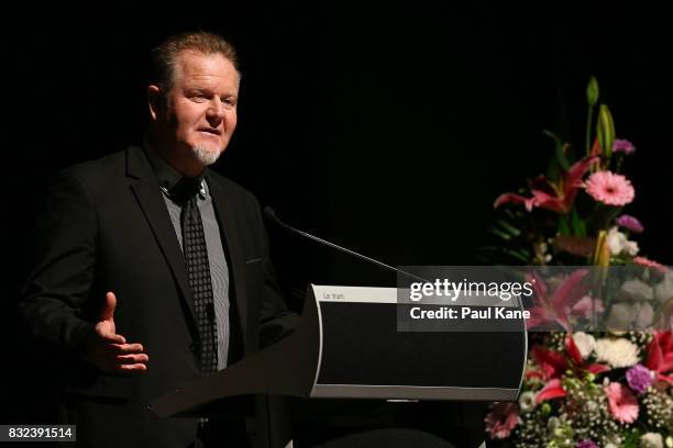 Pastor Phil Ayres addresses the attendees during the funeral service for Betty Cuthbert at Mandurah Performing Arts Centre on August 16, 2017 in...