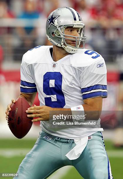 Tony Romo of the Dallas Cowboys looks to pass during the game against the Arizona Cardinals at University of Phoenix Stadium on October 12, 2008 in...