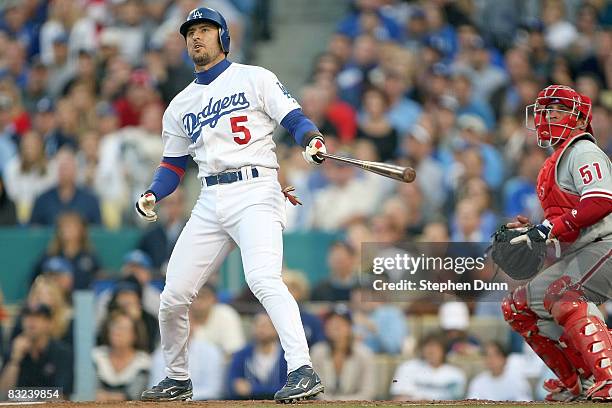 Nomar Garciaparra of the Los Angeles Dodgers hits a ball foul in the bottom of the first inning against the Philadelphia Phillies in Game Three of...
