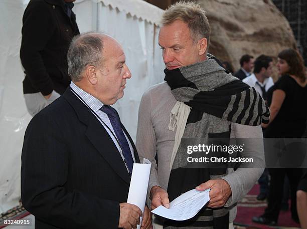 Harvey Goldsmith talks to Sting prepares to perform at a Memorial Concert to Luciano Pavarotti at Little Petra to celebrate the life of the singer as...