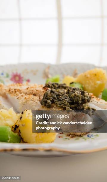 cod with salsa verde, celery and potatoes. - celery sticks stock pictures, royalty-free photos & images