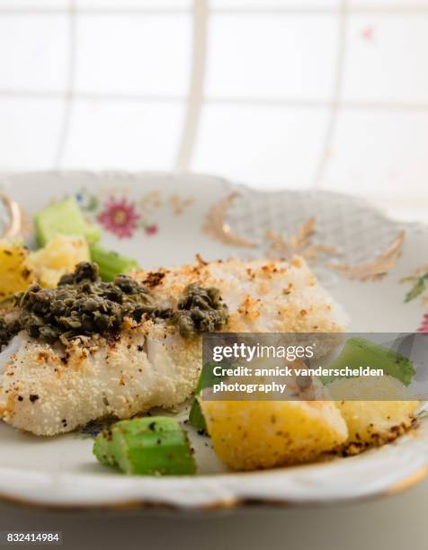 cod with salsa verde, celery and potatoes. - celery sticks stock pictures, royalty-free photos & images