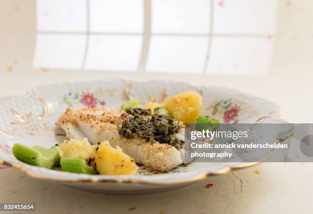 cod with salsa verde, celery and potatoes. - white vinegar stock pictures, royalty-free photos & images