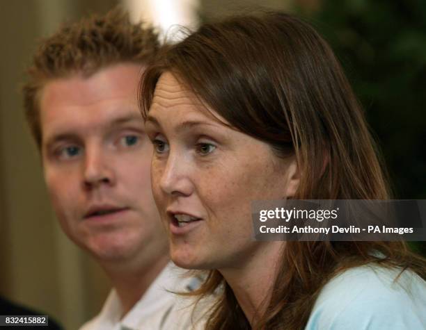 Mark Lawrence and Clare Carey, parents of Harvey Lawrence who was attacked by a Rottweiler, speak at a press conference at St Richard's hospital in...