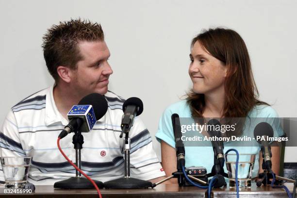 Mark Lawrence and Clare Carey, parents of Harvey Lawrence who was attacked by a Rottweiler, speak at a press conference at St Richard's hospital in...