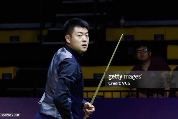 Liang Wenbo of China reacts during a qualifying match against Ian Burns of England on day one of Evergrande 2017 World Snooker China Champion at...