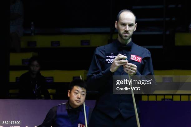 Ian Burns of England reacts during a qualifying match against Liang Wenbo of China on day one of Evergrande 2017 World Snooker China Champion at...