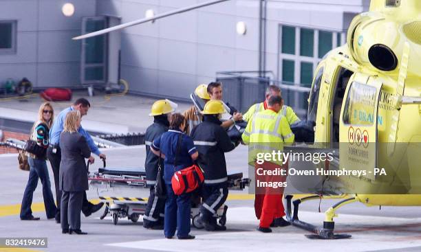 Top Gear's Richard Hammond leaves Leeds General Infirmary accompanied by his wife Amanda also known as Mindy today.