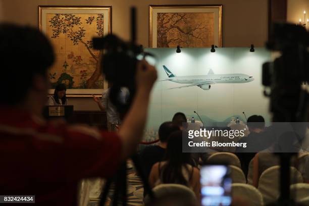 Members of the media wait for the Cathay Pacific Airways Ltd. News conference to begin in Hong Kong, China, on Wednesday, Aug. 16, 2017. Cathay...