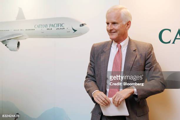 John Slosar, chairman of Cathay Pacific Airways Ltd., prepares to leave a news conference in Hong Kong, China, on Wednesday, Aug. 16, 2017. Cathay...
