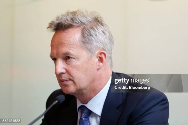 Rupert Hogg, chief executive officer of Cathay Pacific Airways Ltd., listens during a news conference in Hong Kong, China, on Wednesday, Aug. 16,...