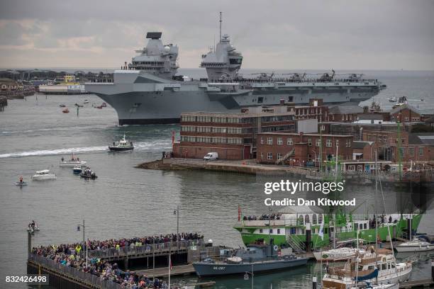 The HMS Queen Elizabeth arrives on August 16, 2017 in Portsmouth, England. The HMS Queen Elizabeth is the lead ship in the new Queen Elizabeth class...