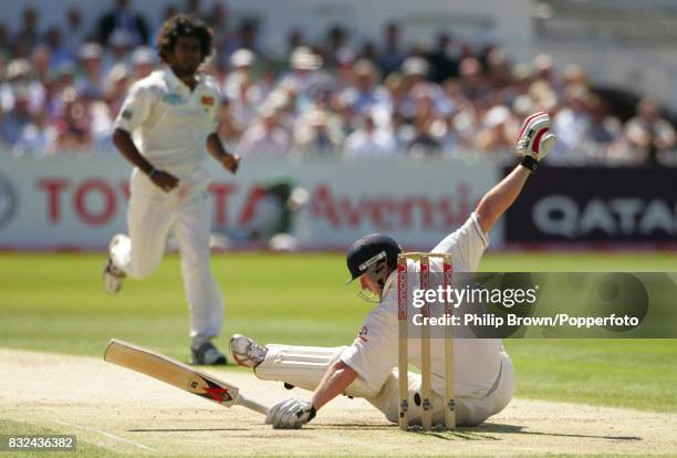 England batsman Paul Collingwood is put on the ground by a bouncer from Sri Lanka bowler Lasith Malinga during the 3rd Test match between England and...