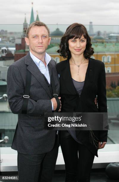 Actor Daniel Craig and actress Olga Korylenko pose during a photocall for the new James Bond film 'Quanturm Of Solace', on the roof of Ritz-Carlton...