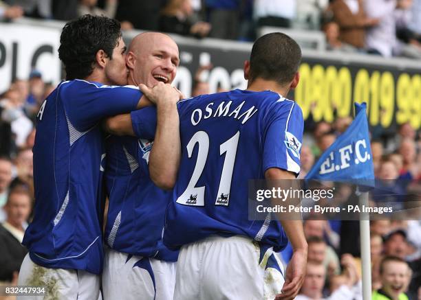 Everton's Andrew Johnson celebrates his goal with Mikel Arteta and Leon Osman
