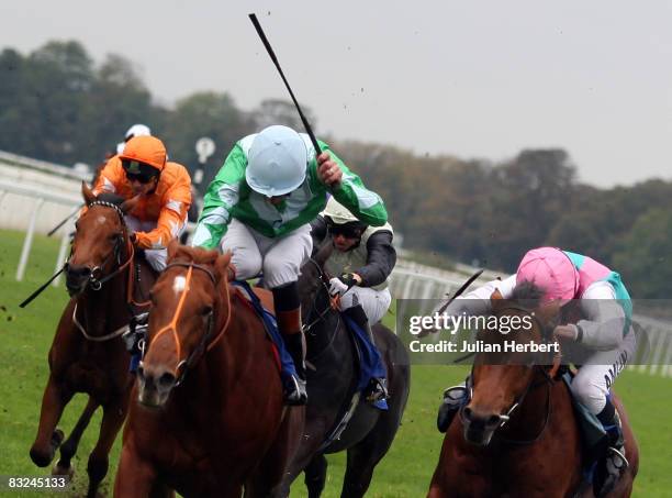 Richard Hughes and Bold Tie get the better of Standpoint ridden by jockey Ryan Moore to land the E.B.f. Maiden Stakes Race run at Windsor Racecourse...