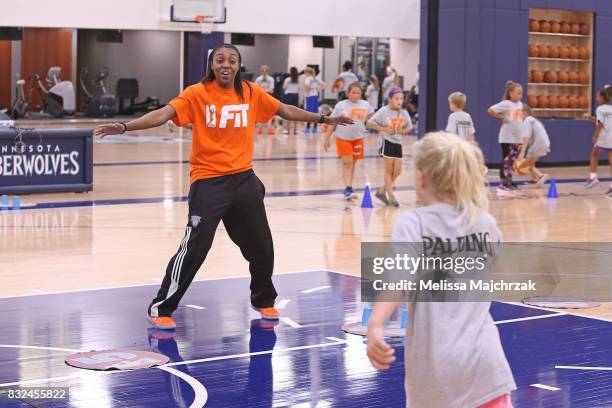 Renee Montgomery of the Minnesota Lynx interacts with young fans during a WNBA FIT Clinic at The Courts at Mayo Clinic Square on August 14, 2017 in...