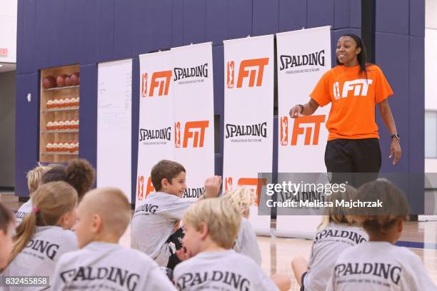 Renee Montgomery of the Minnesota Lynx interacts with young fans during a WNBA FIT Clinic at The Courts at Mayo Clinic Square on August 14, 2017 in...