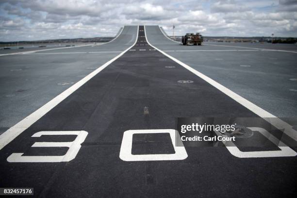 Numbering is displayed on the take-off deck of HMS Queen Elizabeth on August 16, 2017 in Portsmouth, England. HMS Queen Elizabeth is the lead ship in...