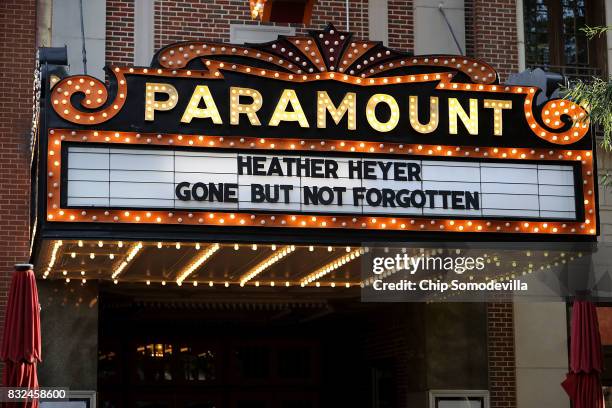 The Paramount Theater marquee bears to name of Heather Heyer, who was killed when a car slamed into a crowd of people protesting against a white...