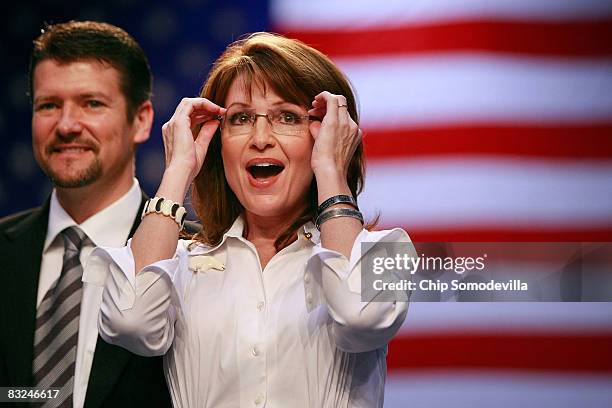 Republican vice presidential candidate Alaska Gov. Sarah Palin and her husband Todd Palin attend a rally at the Virginia Beach Convention Center...