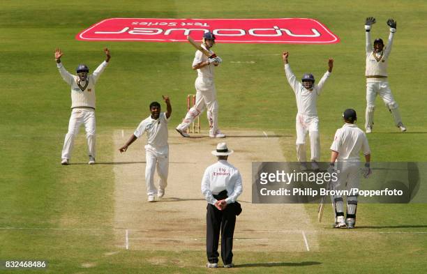 Muttiah Muralitharan of Sri Lanka gets the wicket of England batsman Kevin Pietersen, caught by Tillakaratne Dilshan for 6 runs, during the 3rd Test...