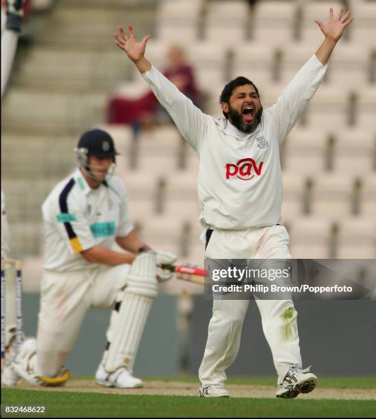 Mushtaq Ahmed of Sussex celebrates after getting the final Hampshire wicket of Chris Tremlett and his seventh wicket of the innings to win the County...