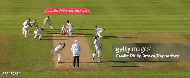 Monty Panesar of England bowls the last ball of the day to Sri Lanka's Farveez Maharoof with fielders surrounding the bat during the 2nd Test match...