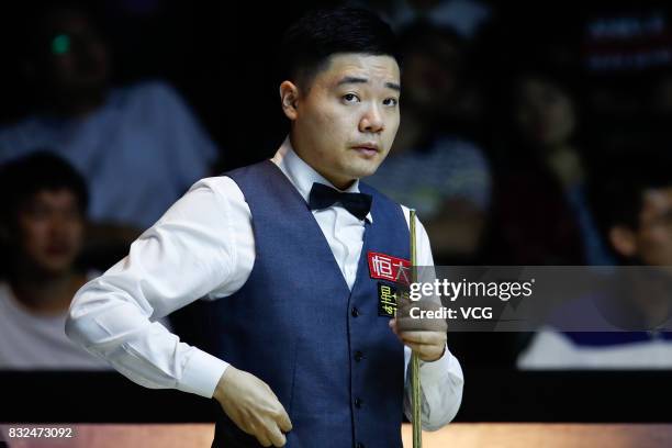 Ding Junhui of China reacts during a qualifying match against Niu Zhuang of China on day one of Evergrande 2017 World Snooker China Champion at...