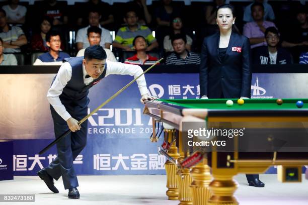 Ding Junhui of China reacts during a qualifying match against Niu Zhuang of China on day one of Evergrande 2017 World Snooker China Champion at...