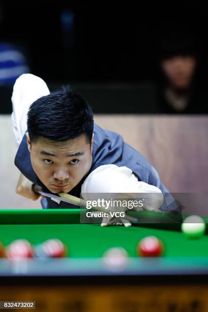 Ding Junhui of China plays a shot during a qualifying match against Niu Zhuang of China on day one of Evergrande 2017 World Snooker China Champion at...