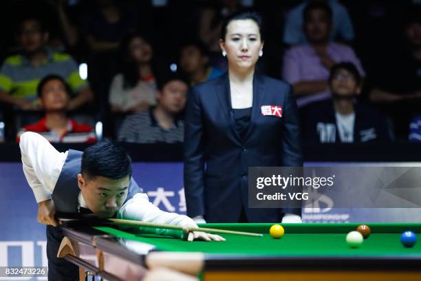 Ding Junhui of China plays a shot during a qualifying match against Niu Zhuang of China on day one of Evergrande 2017 World Snooker China Champion at...