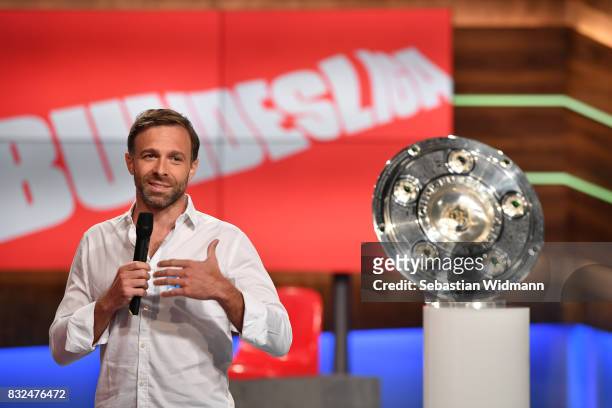Gernot Bauer, head of sports for local sports production at Discovery Deutschland gestures during the Eurosport Bundesliga Media Day on August 16,...