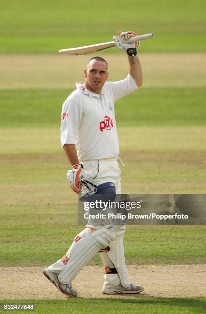 Michael Yardy of Sussex celebrates reaching his century during his innings of 119 runs in the County Championship match between Nottinghamshire and...