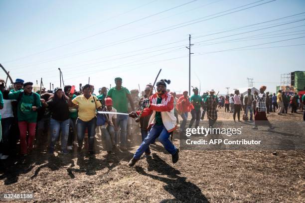 Members of the Association of Mineworkers and the Marikana community gather to commemorate the fifth anniversary of the Marikana Massacre in...