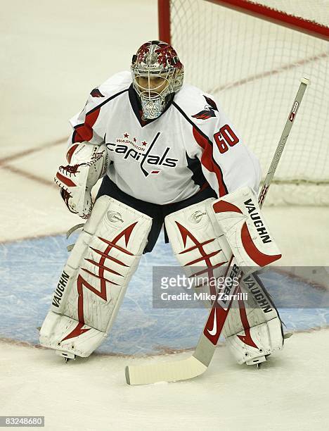 Goaltender Jose Theodore of the Washington Capitals gets prepared for a shot during the game against the Atlanta Thrashers at Philips Arena on...