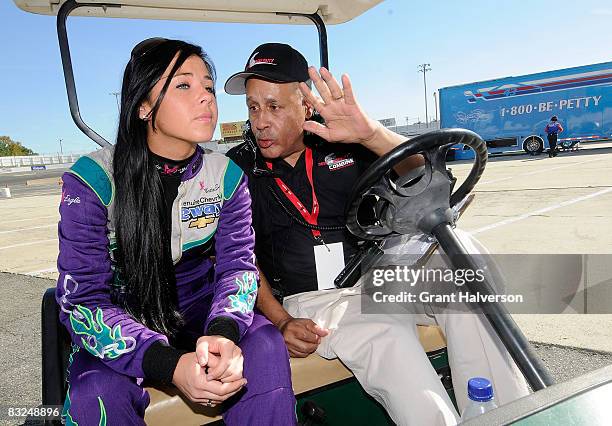 Natalie Sather talks with Wendell Scott during the NASCAR Drive for Diversity Combine at South Boston Speedway on October 13, 2008 in South Boston,...