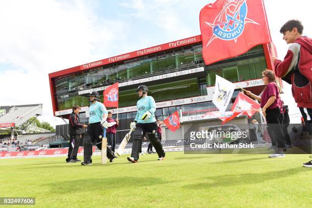 Tammy Beaumont and Lizelle Lee of Surrey Stars walk out to bat during the Kia Super League 2017 match between Lancashire Thunder and Surrey Stars at...